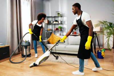 cleaners cleaning the house